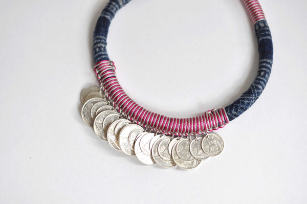 the coin necklace